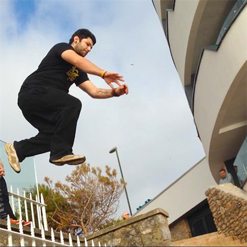 Parkour Training - Man Jumping Between Buildings Parkour Training - Man Jumping Between Buildings